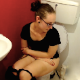 A brunette girl with glasses records herself taking a shit while sitting on a toilet in 5 different scenes. She shows her facial expressions as she makes clearly audible pooping sounds. Presented in 720P HD quality. Over 7.5 minutes.